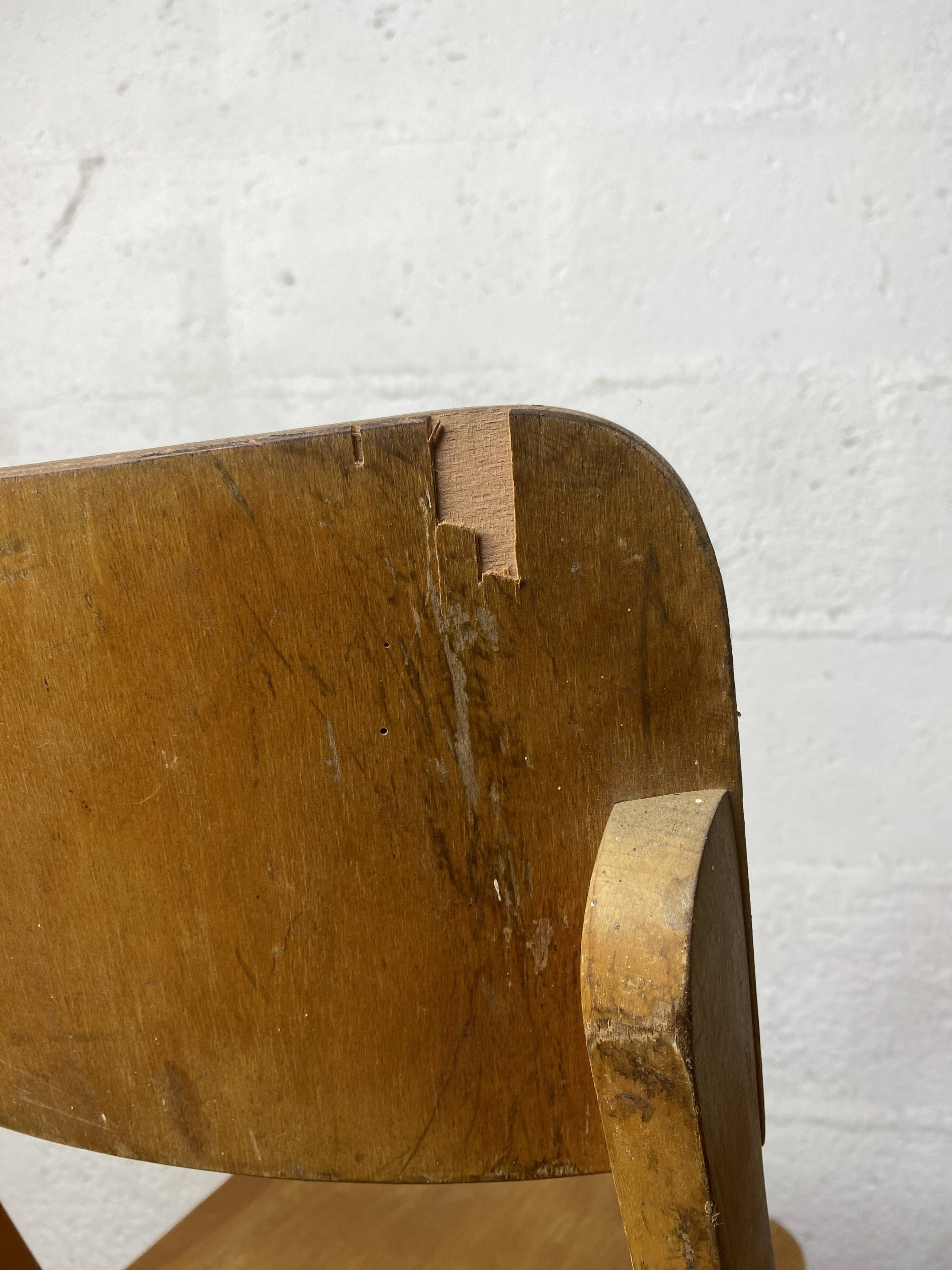 Pair of mismatched wooden folding chairs