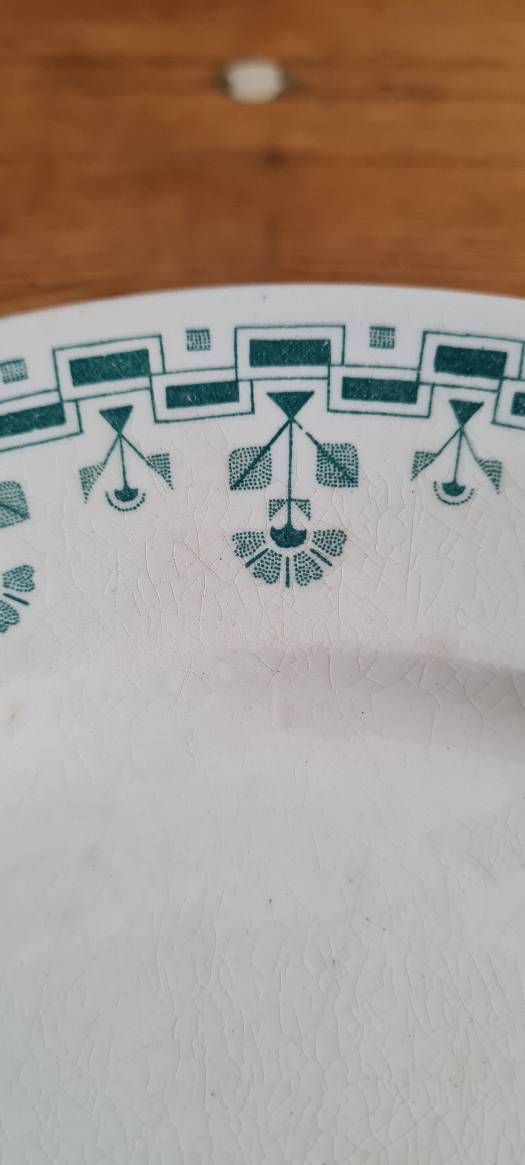 Set of 7 mismatched plates in iron earth