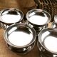 Lot de douze coupes anciennes en inox