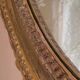 Antique oval mirror with gold leaf – Pediment with bow & floral motifs style