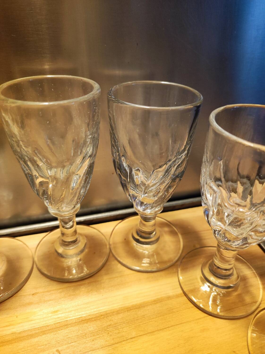 12 small twisted bistro glasses, 19th century