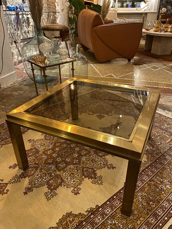 Table basse carrée dorée et verre fumé
