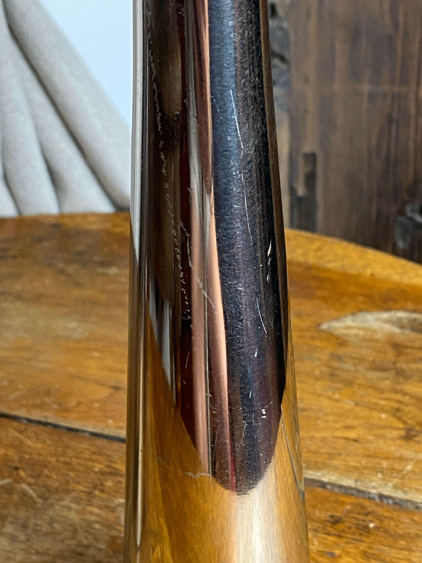 Pair of polished aluminium candlesticks