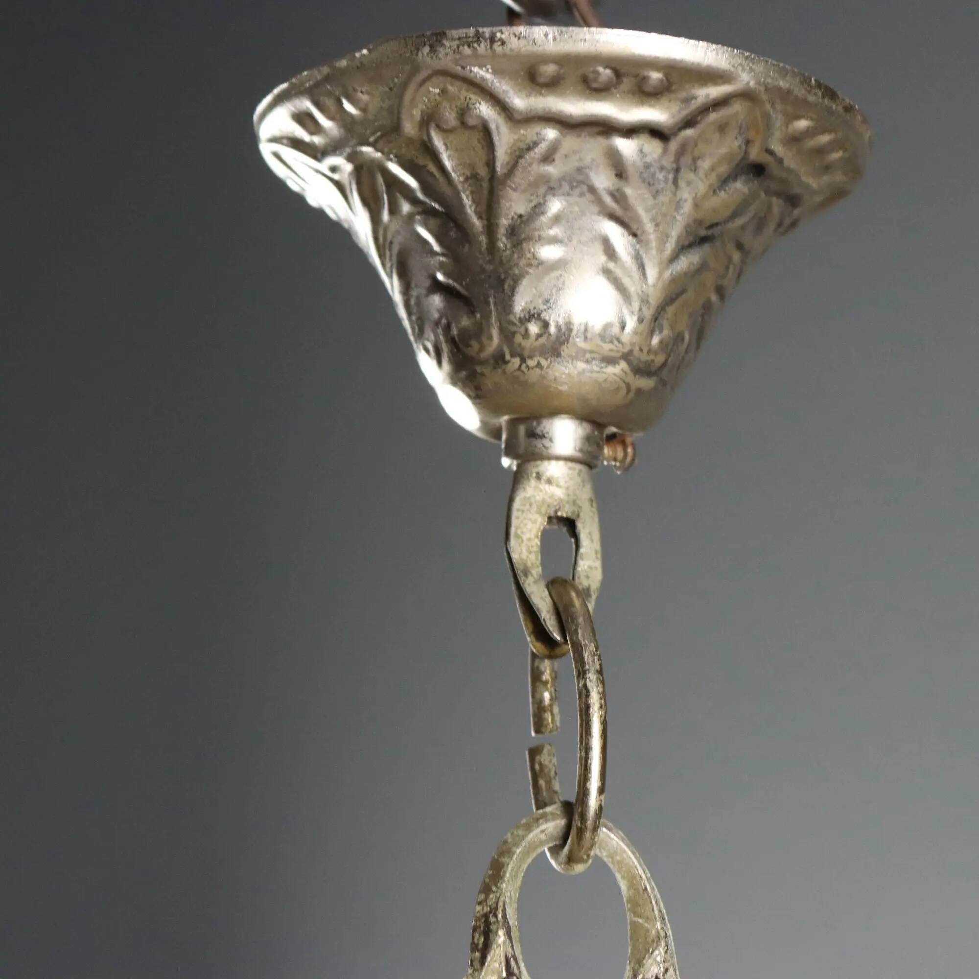 Antique chandelier in the shape of a balloon in silver-plated metal and glass, 20th century.