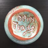 Turquoise vase with iris decor