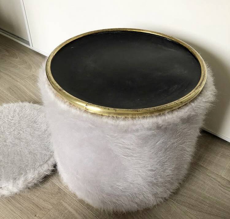 Vintage brass pouf with fur.
