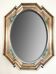Vintage octagonal mirror, molar glass, patinated green silvering, floral decoration.