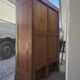 Antique 1950s double sliding door filing cabinet with curtains