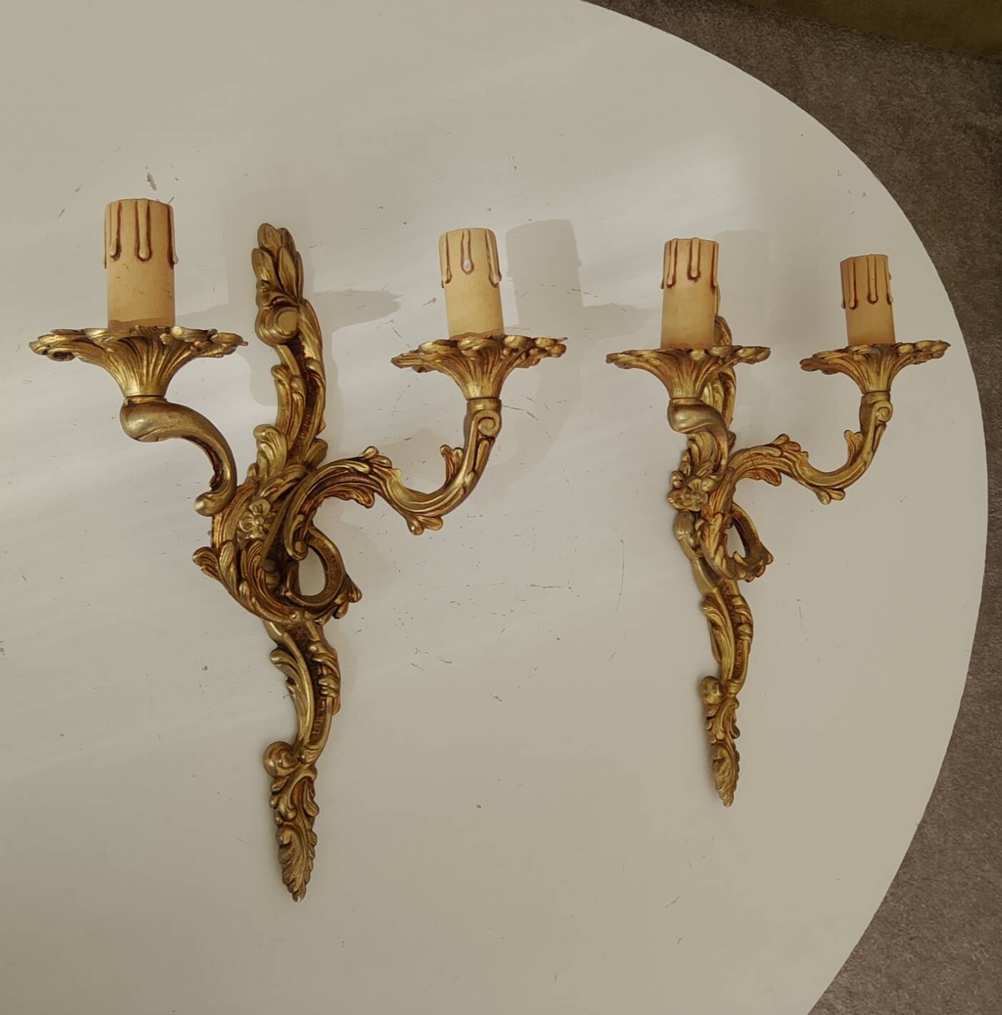 Pair of antique Rococo wall sconces in Louis XV style.