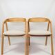 Vintage chairs in light oak and natural linen beige.