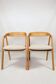 Vintage chairs in light oak and natural linen beige.