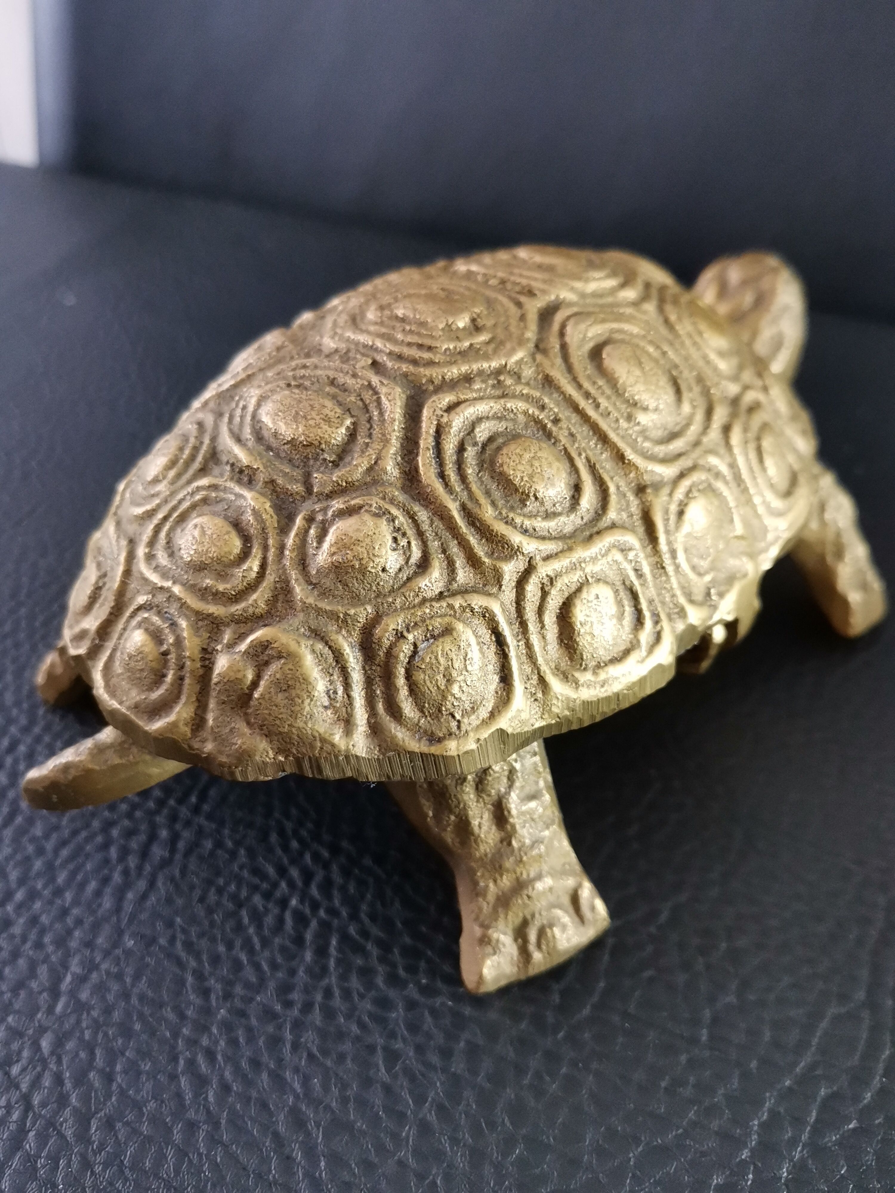 Empty vintage animal bronze pocket