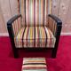 Art Deco armchair in multicolored striped fabric and its footrest