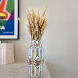 Vase en céramique à rayures fleuri