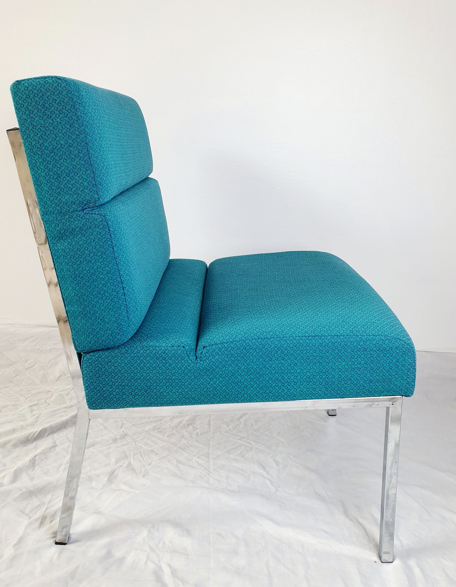 Vintage metal and fabric armchair