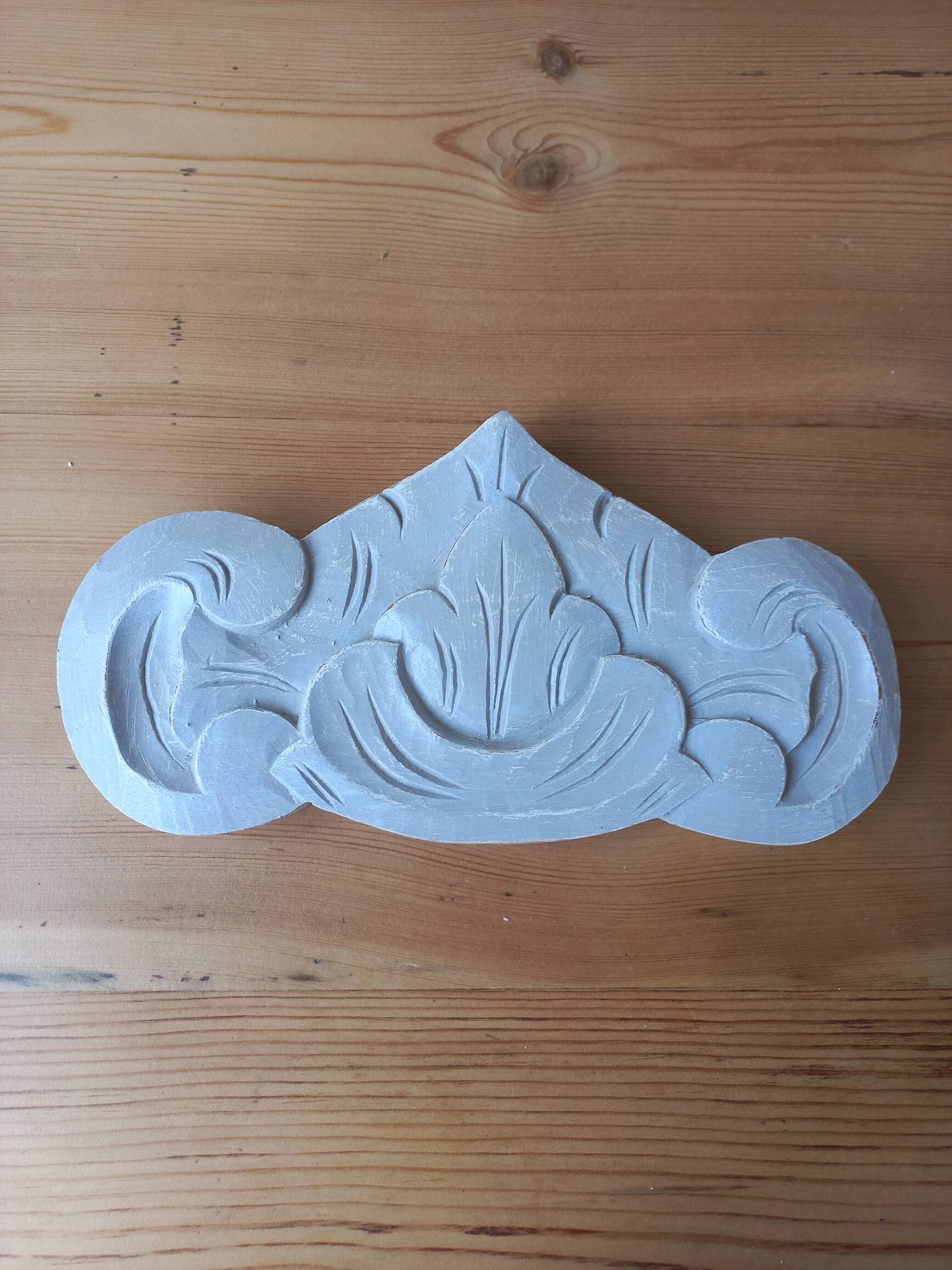 Linen patinated carved pediment woodwork