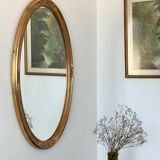 Oval mirror in carved wood