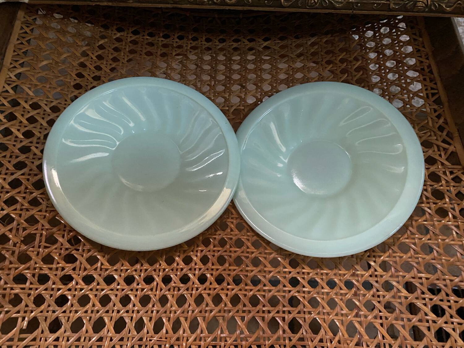 A pair of antique opaline tea cups.
