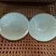 A pair of antique opaline tea cups.