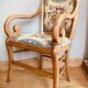 19th century St Empire armchair in pegged blond walnut with cross-stitched tapestries