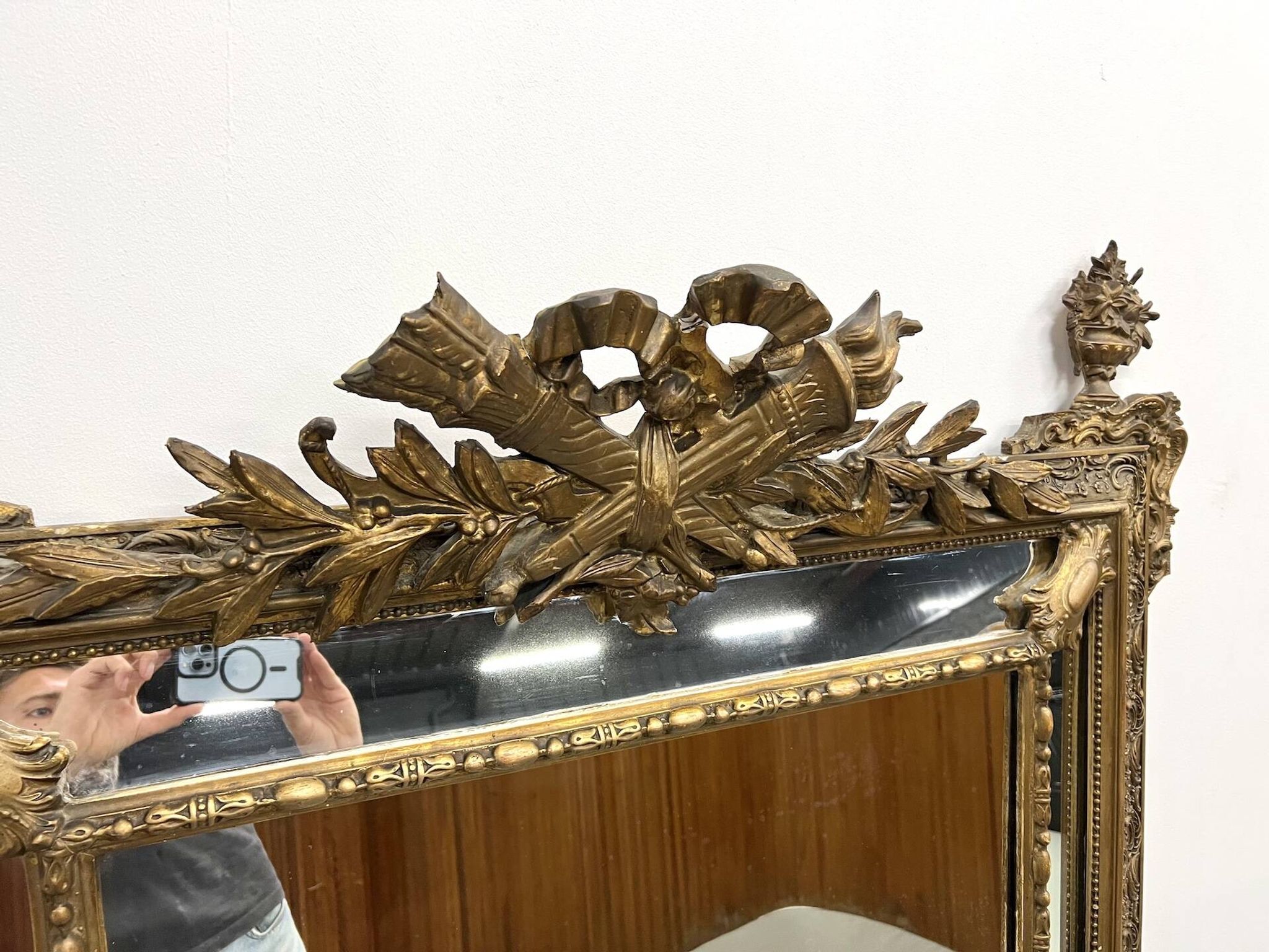 Large antique pediment mirror with mouldings.