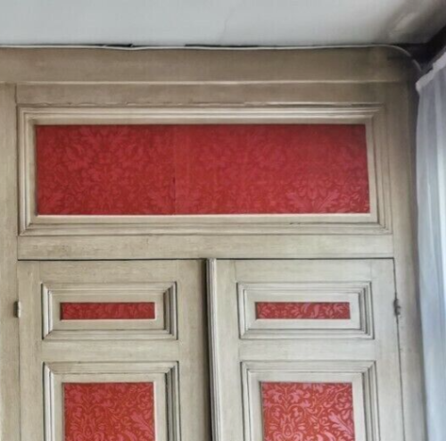 Closet front with double molded doors in patinated wood XX century