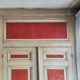 Closet front with double molded doors in patinated wood XX century