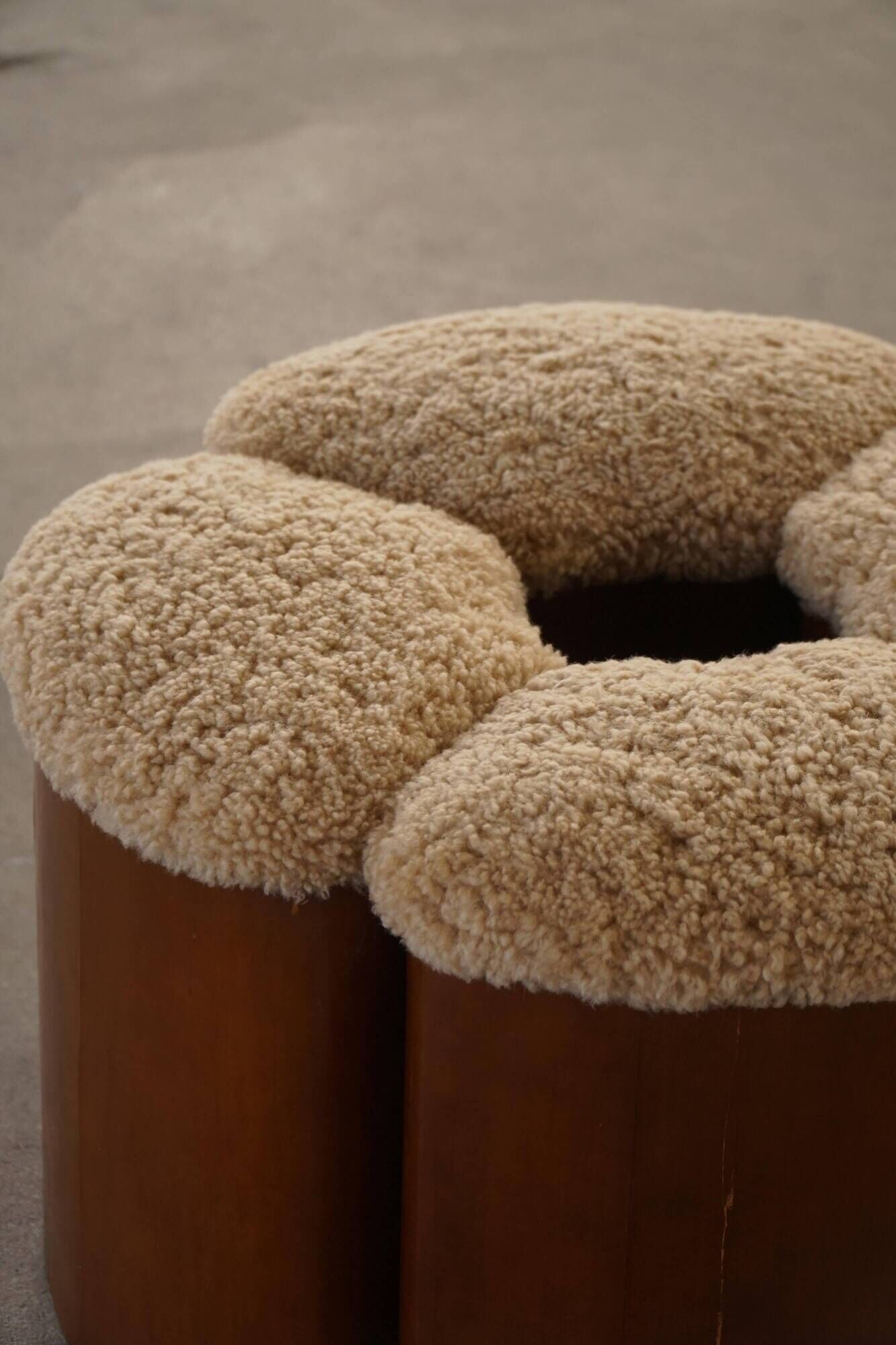 Set of 4 sculptural French Art Deco stools in wood and lamb's wool, 1940s.