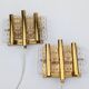 Pair of Hans-Agne Jakobsson wall lights in brass and pressed glass