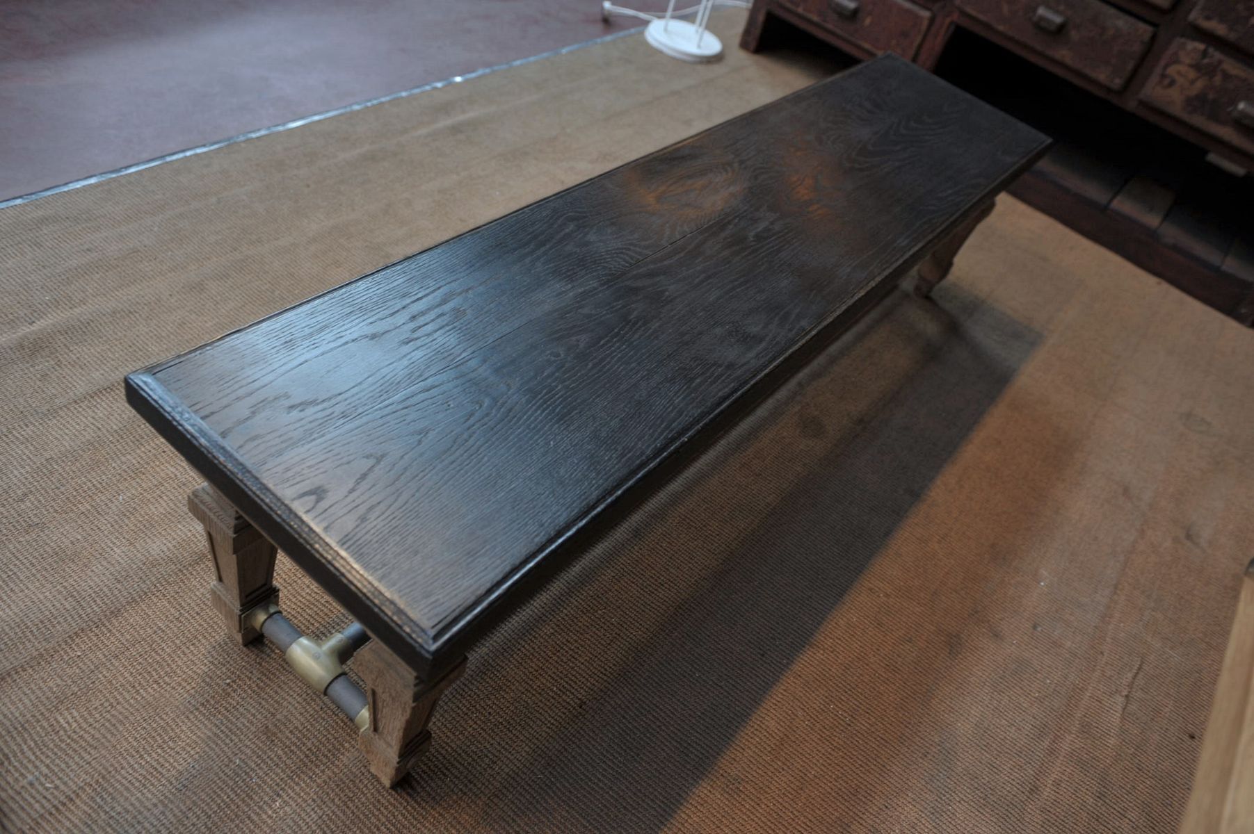Ancient bench in solid oak and french bank brass