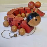 Vintage pulling toy, "centipede", 82 cm, made in Switzerland