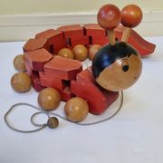 Vintage pulling toy, "centipede", 82 cm, made in Switzerland