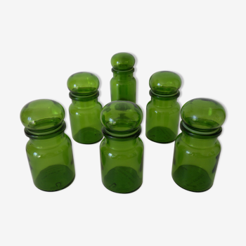 Green vintage set of six jars.