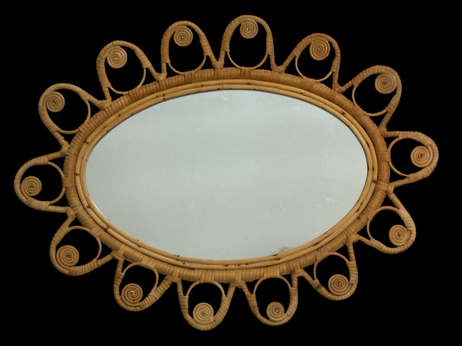 Oval rattan mirror from the 1950s France
