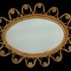 Oval rattan mirror from the 1950s France