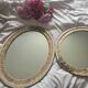 paire de miroirs ovales anciens