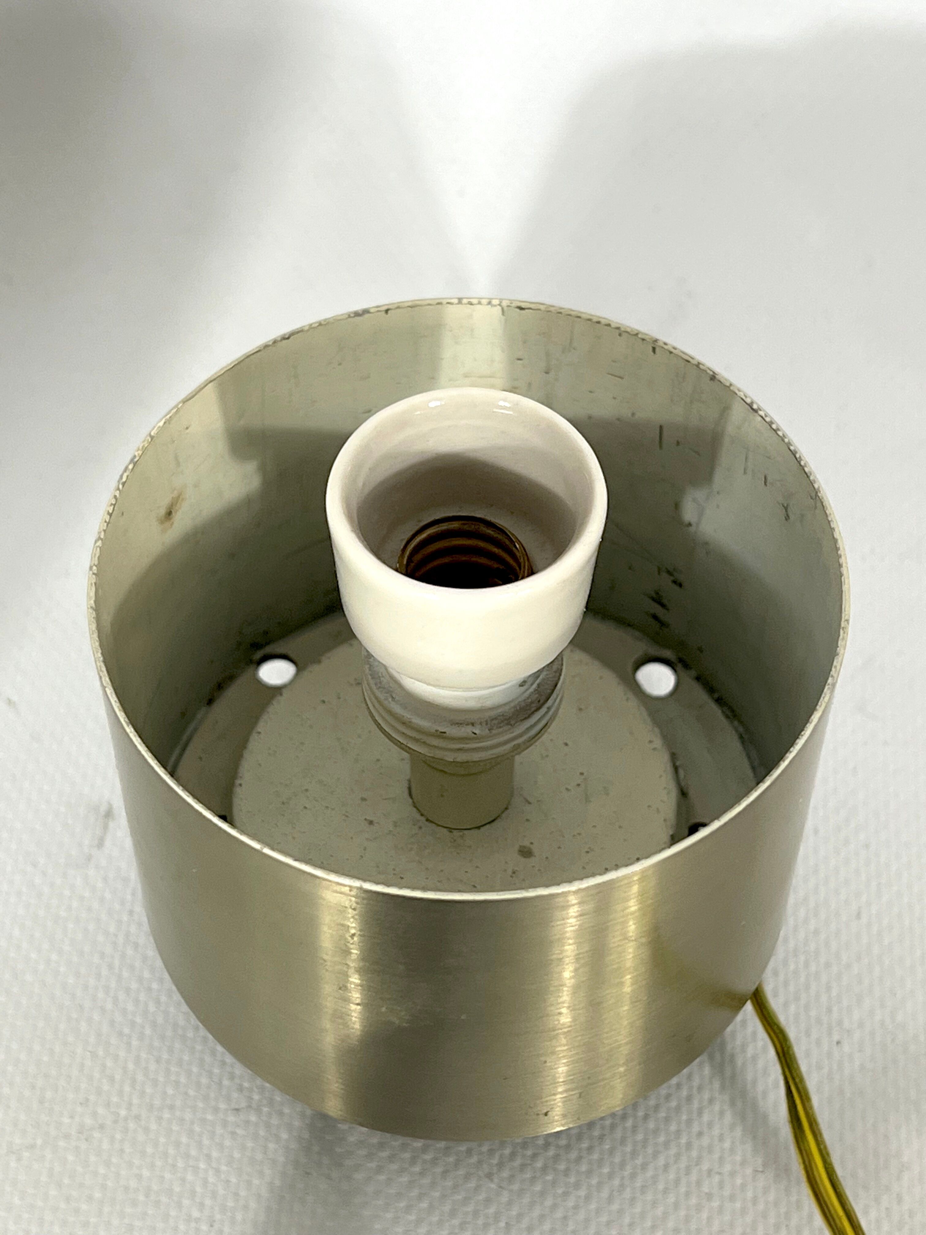 Mid-century modern pair of rare labeled Lumi Milano table lamps