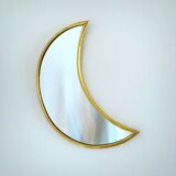Moon-shaped gilded brass wall mirror, 24x9 cm