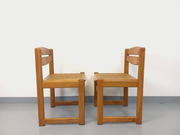 Paire de chaises traîneau vintage en bois de hêtre et cannage des années 70