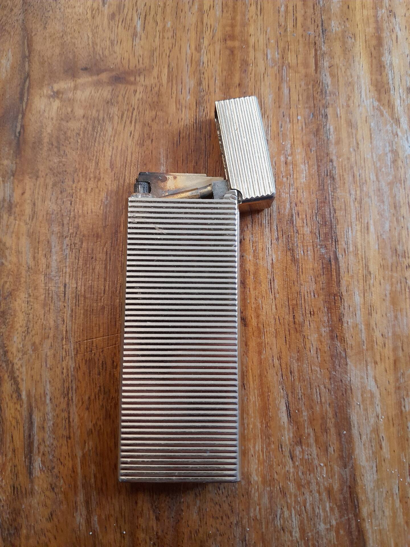 Vintage Pierre Cardin gold lighter, 1970s-80s.