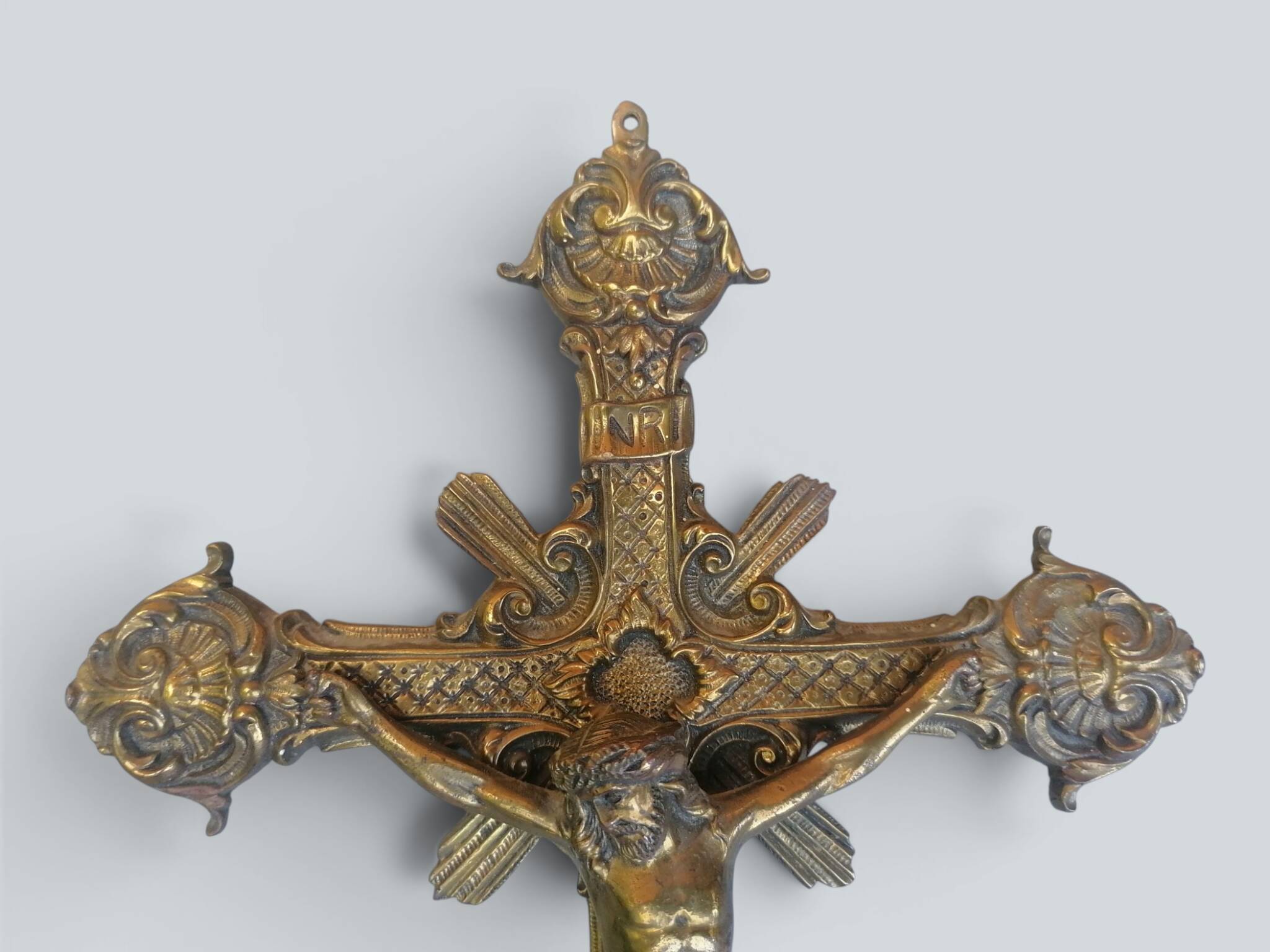 Ornate engraved brass crucifix, Christian cross, Jesus Christ.