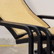 Rocking lounge chair, curved wood, leather, Viennese cane design.
