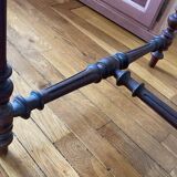 Table with a spacer topped with a spinning top.