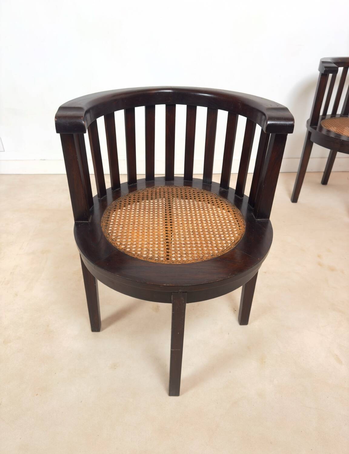 Set of 2 colonial armchairs in wood and cane.