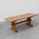 20th Century French oak trestle table with scalloped legs and plank top