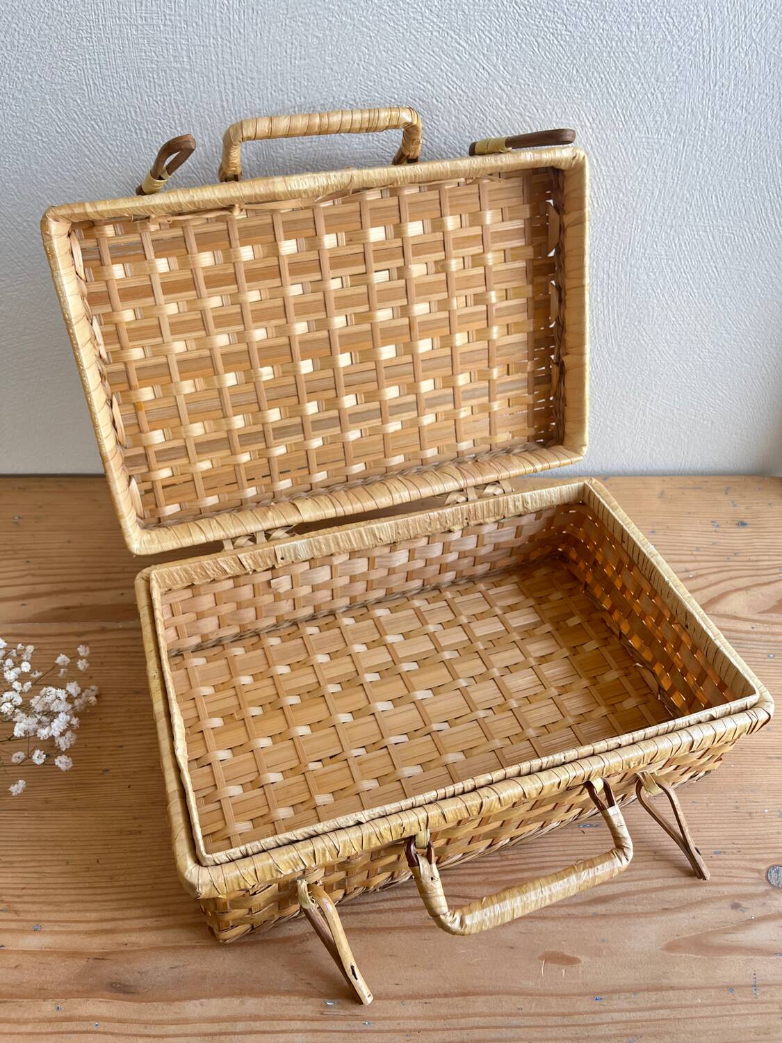 Vintage woven wicker suitcase