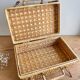 Vintage woven wicker suitcase