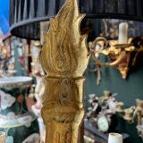 Set of three Empire-style candlesticks.