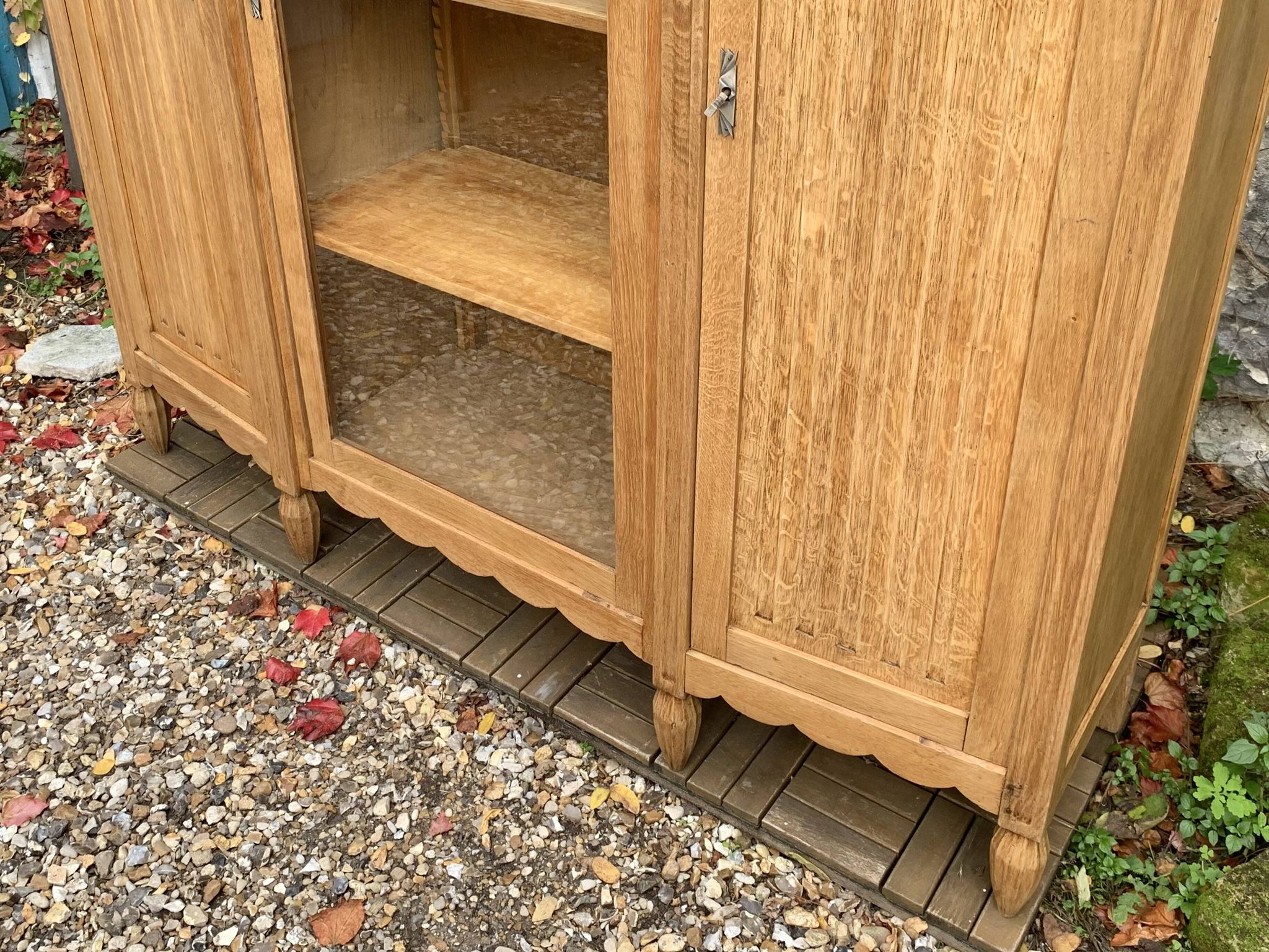 Asymmetrical Art Deco glass-fronted Parisian wardrobe in raw oak, 1930.
