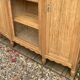 Asymmetrical Art Deco glass-fronted Parisian wardrobe in raw oak, 1930.
